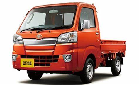 Kei Trucks or Mini Vehicles which is best? Orange Kei truck shown.
